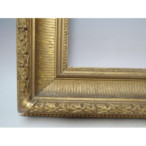 62 - A 19TH CENTURY GOLD FRAME WITH ACANTHUS LEAF DESIGN TO OUTER EDGE, frame W 9.5 cm, frame rebate 46.5... 