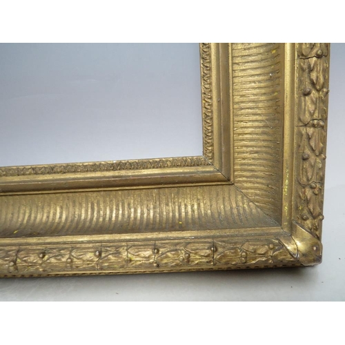 62 - A 19TH CENTURY GOLD FRAME WITH ACANTHUS LEAF DESIGN TO OUTER EDGE, frame W 9.5 cm, frame rebate 46.5... 