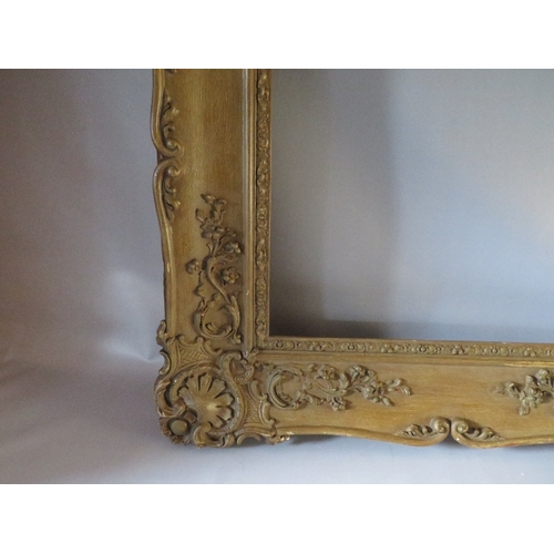 47 - A 19TH CENTURY GOLD SWEPT FRAME, frame W 13 cm, rebate 105 x 76 cm