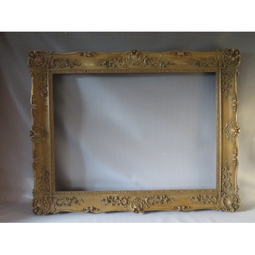 47 - A 19TH CENTURY GOLD SWEPT FRAME, frame W 13 cm, rebate 105 x 76 cm