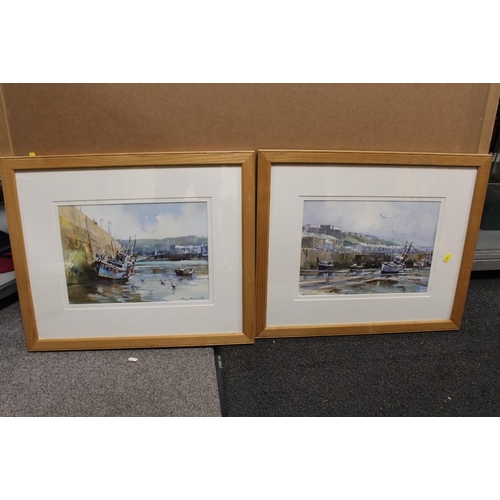 18 - A PAIR OF PINE FRAMED AND GLAZED WATERCOLOURS DEPICTING HARBOUR SCENES WITH MOORED BOATS BY RAY BALK... 