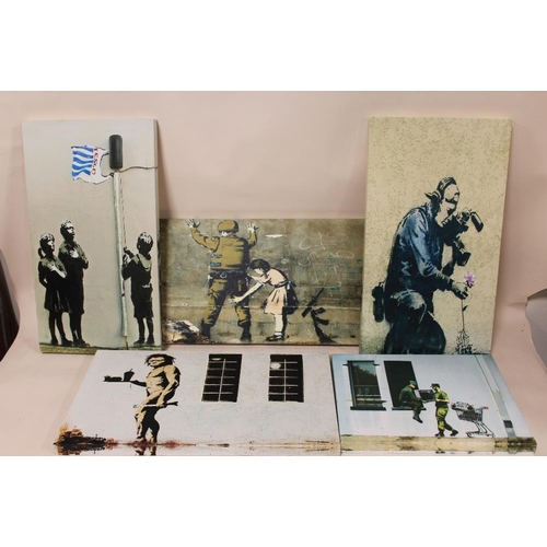 39 - FIVE MODERN BANKSY PRINTS ON CANVAS LARGEST SIZE - 45CM X 25CM