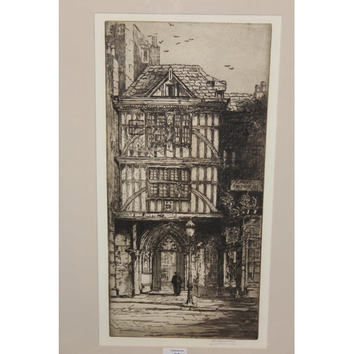 60 - A FRAMED AND GLAZED SIGNED PRINT OF A FIGURE IN AN ARCHWAY