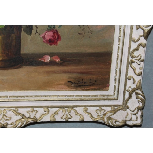 65 - A FRAMED STILL LIFE OIL ON CANVAS STUDY OF ROSES IN A VASE INDISTINCTLY SIGNED LOWER RIGHT SIZE - 49... 