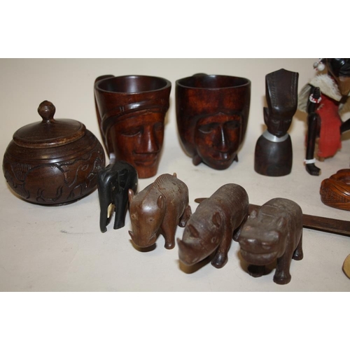 224 - A COLLECTION OF AFRICAN CARVED WOODEN TRIBAL STYLE FIGURES TOGETHER WITH TWO WOODEN FIGURATIVE CUPS ... 