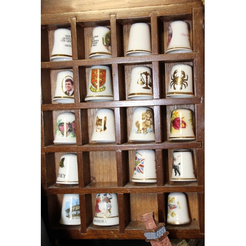 176 - A WICKER BASKET OF COLLECTABLES TOGETHER WITH AN ORIENTAL HAND PAINTED TEA SET