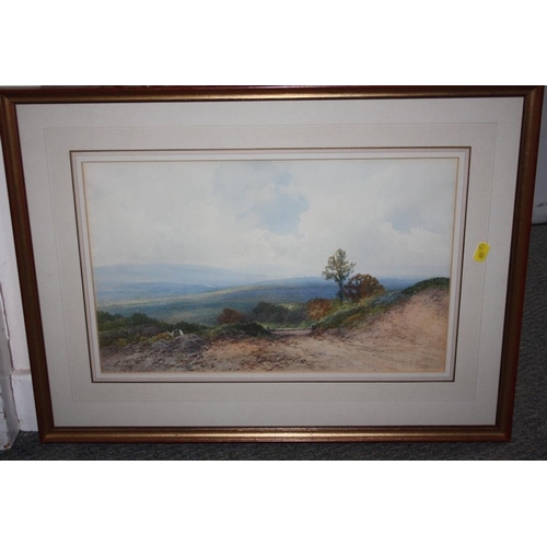 111 - FREDERICK JOHN WIDGERY (1861-1942). A hillside landscape with a figure in the foreground, signed low... 