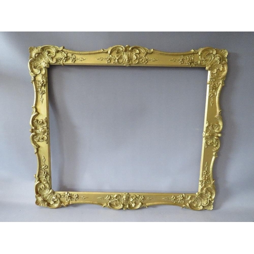 61 - A 19TH CENTURY GOLD SWEPT FRAME, with some restoration, frame W 7 cm, rebate 62 x 52 cm