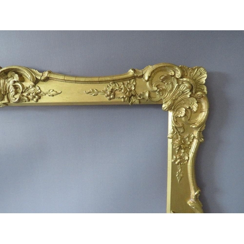 61 - A 19TH CENTURY GOLD SWEPT FRAME, with some restoration, frame W 7 cm, rebate 62 x 52 cm
