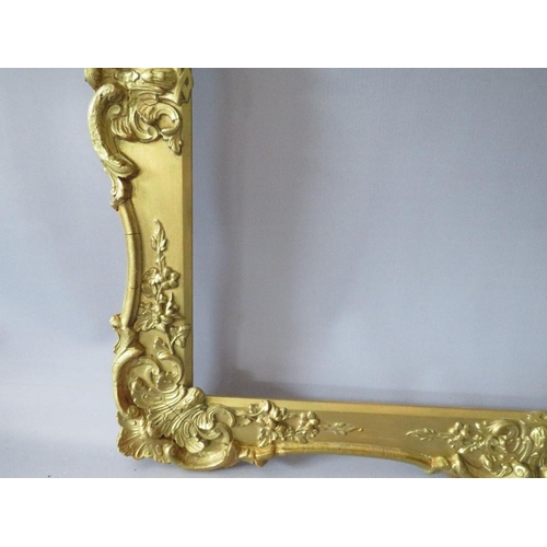 61 - A 19TH CENTURY GOLD SWEPT FRAME, with some restoration, frame W 7 cm, rebate 62 x 52 cm