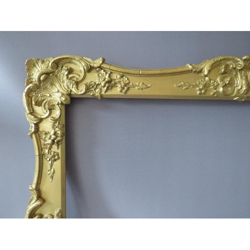61 - A 19TH CENTURY GOLD SWEPT FRAME, with some restoration, frame W 7 cm, rebate 62 x 52 cm