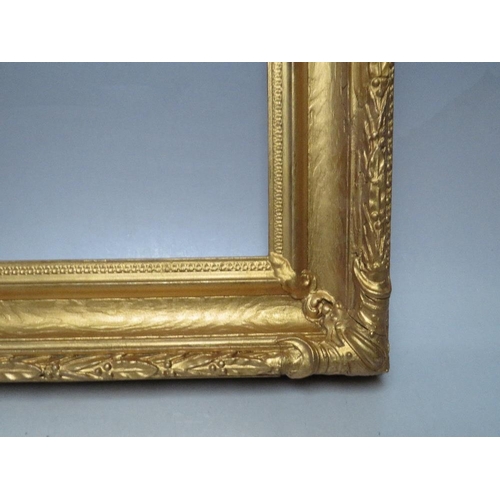 62 - A 19TH CENTURY DECORATIVE GOLD FRAME, with acanthus leaf design to edges and corner embellishments, ... 