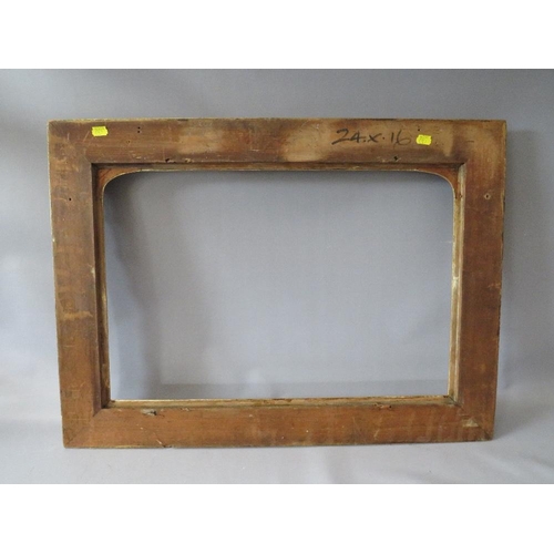 63 - A 19TH CENTURY DECORATIVE GOLD FRAME, with arched top integral slip, some restoration, frame W 8 cm,... 