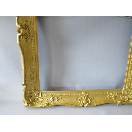 64 - A 19TH CENTURY GOLD SWEPT FRAME, with some restoration, frame W 8 cm, rebate 63 x 51 cm