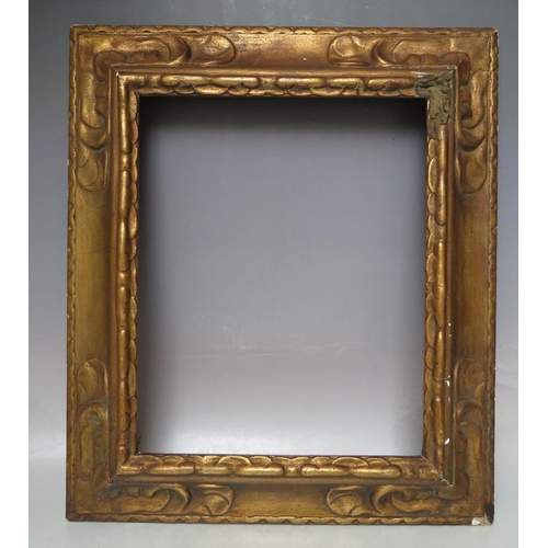 66 - A LATE 19TH / EARLY 20TH CENTURY DECORATIVE GOLD FRAME, frame W 9 cm, rebate 43 x 35 cm