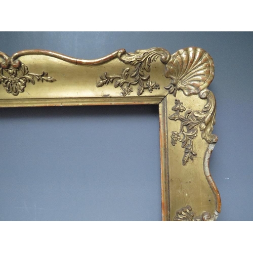 67 - A LATE 18TH / EARLY 19TH CENTURY GOLD DECORATIVE FRAME, with corner embellishments, frame W 8 cm,  r... 