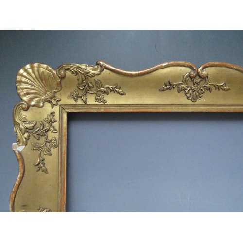 67 - A LATE 18TH / EARLY 19TH CENTURY GOLD DECORATIVE FRAME, with corner embellishments, frame W 8 cm,  r... 