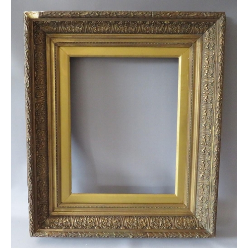 69 - A PAIR OF 19TH CENTURY DECORATIVE GOLD FRAMES, with acanthus leaf design to outer edge and gold slop... 