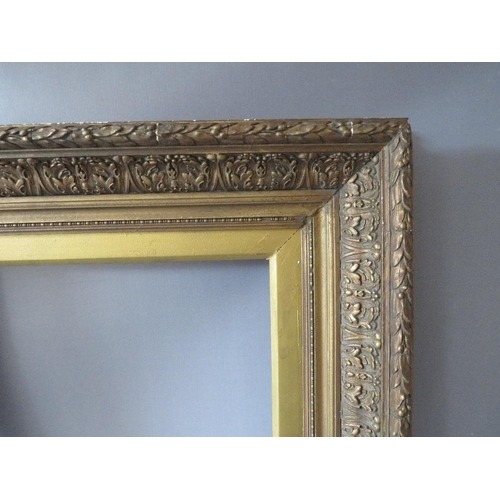 69 - A PAIR OF 19TH CENTURY DECORATIVE GOLD FRAMES, with acanthus leaf design to outer edge and gold slop... 