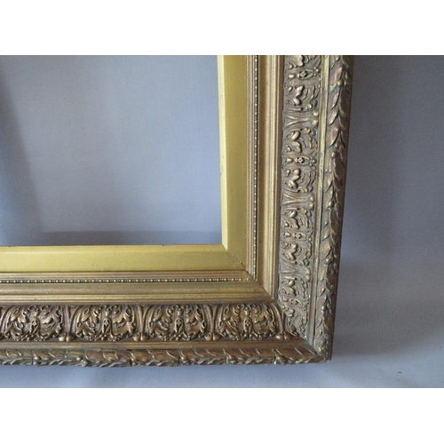69 - A PAIR OF 19TH CENTURY DECORATIVE GOLD FRAMES, with acanthus leaf design to outer edge and gold slop... 