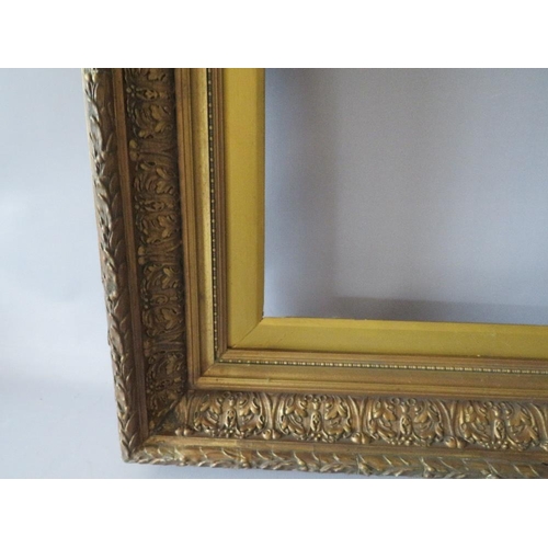 69 - A PAIR OF 19TH CENTURY DECORATIVE GOLD FRAMES, with acanthus leaf design to outer edge and gold slop... 