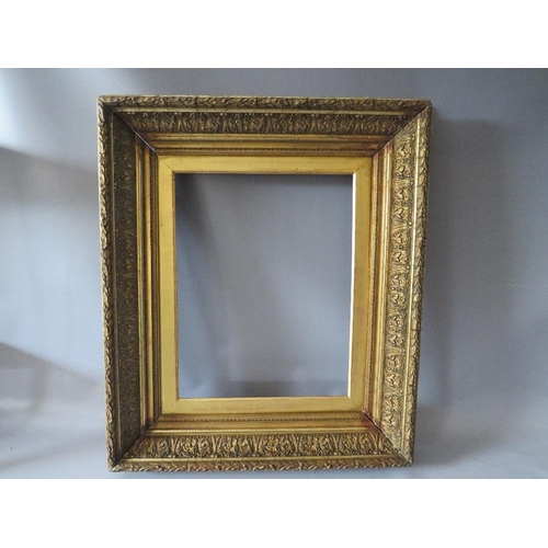 69 - A PAIR OF 19TH CENTURY DECORATIVE GOLD FRAMES, with acanthus leaf design to outer edge and gold slop... 