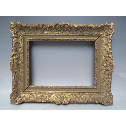 70 - A LATE 18TH / EARLY 19TH CENTURY CARVED WOODEN GOLD DECORATIVE FRAME, frame W 8 cm, rebate 34 x 24 c... 