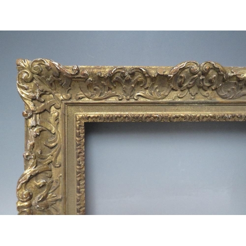 70 - A LATE 18TH / EARLY 19TH CENTURY CARVED WOODEN GOLD DECORATIVE FRAME, frame W 8 cm, rebate 34 x 24 c... 
