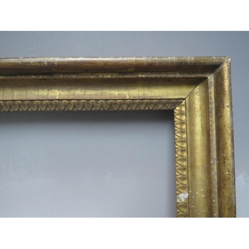 71 - A LATE 18TH / EARLY 19TH CENTURY GOLD FRAME, with decorative design to inner edge, frame W 5.5 cm,  ... 