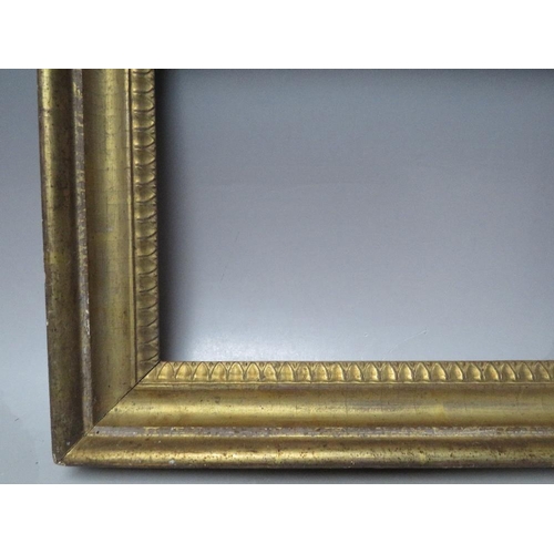 71 - A LATE 18TH / EARLY 19TH CENTURY GOLD FRAME, with decorative design to inner edge, frame W 5.5 cm,  ... 