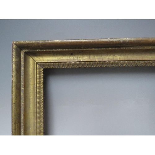 71 - A LATE 18TH / EARLY 19TH CENTURY GOLD FRAME, with decorative design to inner edge, frame W 5.5 cm,  ... 