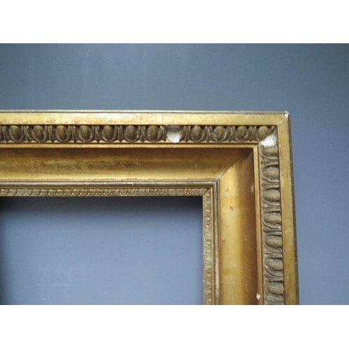 72 - A 19TH CENTURY GOLD FRAME WITH EGG AND DART DESIGN TO OUTER EDGE, frame W 9 cm, rebate 30 x 26 cm