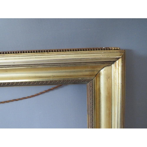 73 - A 19TH CENTURY GOLD FRAME WITH DECORATIVE INNER EDGE, frame W 8 cm, rebate 37 x 52 cm