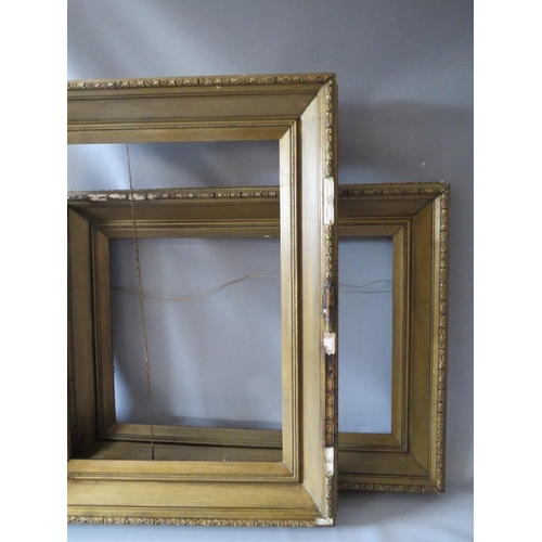 74 - A PAIR OF 19TH CENTURY GOLD FRAMES A/F, with decorative design to outer edge, frame W 11 cm, rebates... 