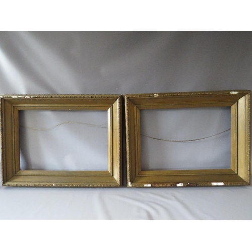 74 - A PAIR OF 19TH CENTURY GOLD FRAMES A/F, with decorative design to outer edge, frame W 11 cm, rebates... 