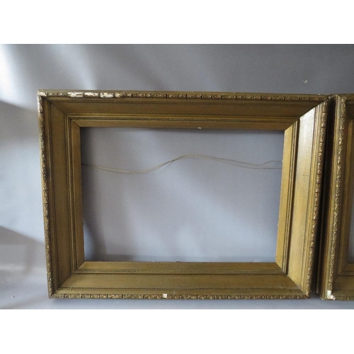 74 - A PAIR OF 19TH CENTURY GOLD FRAMES A/F, with decorative design to outer edge, frame W 11 cm, rebates... 