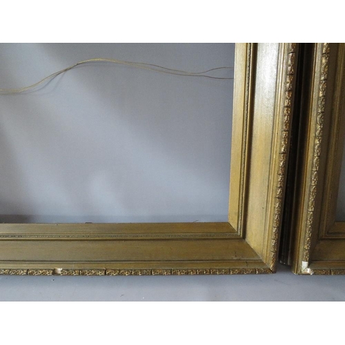 74 - A PAIR OF 19TH CENTURY GOLD FRAMES A/F, with decorative design to outer edge, frame W 11 cm, rebates... 