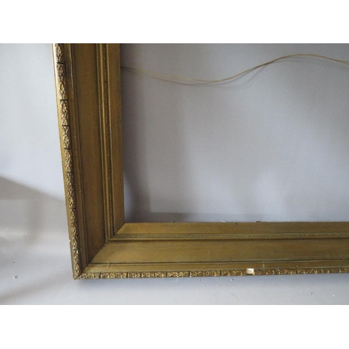 74 - A PAIR OF 19TH CENTURY GOLD FRAMES A/F, with decorative design to outer edge, frame W 11 cm, rebates... 
