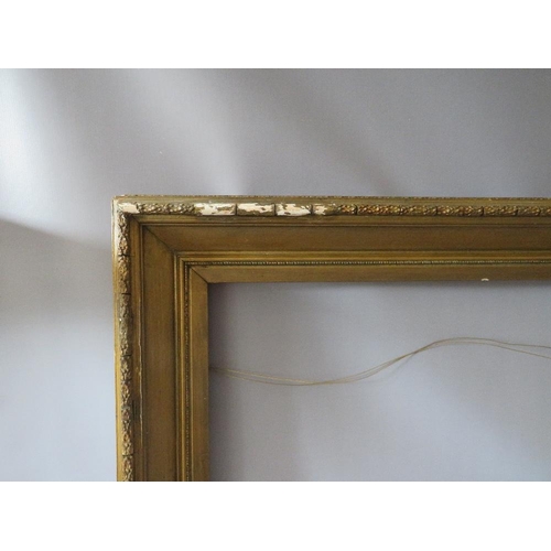 74 - A PAIR OF 19TH CENTURY GOLD FRAMES A/F, with decorative design to outer edge, frame W 11 cm, rebates... 