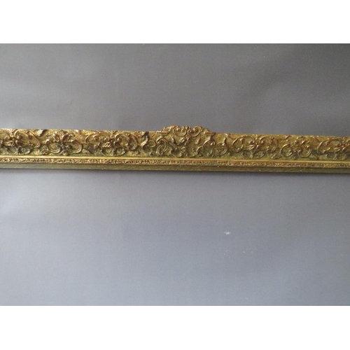 75 - A LATE 19TH / EARLY 20TH CENTURY DECORATIVE GOLD FRAME WITH WOODEN SLIP, frame W 7 cm, slip rebate 1... 