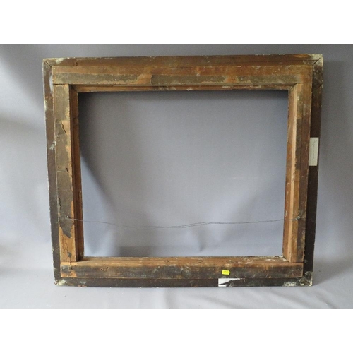 77 - A 19TH CENTURY DECORATIVE GOLD FRAME WITH CORNER EMBELLISHMENTS, frame W 10 cm, rebate 56 x 69 cm