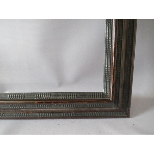 79 - A LATE 19TH / EARLY 20TH CENTURY FAUX TORTOISESHELL DUTCH FRAME, frame W 9 cm, rebate 54 x 65 cm