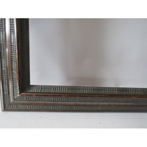 79 - A LATE 19TH / EARLY 20TH CENTURY FAUX TORTOISESHELL DUTCH FRAME, frame W 9 cm, rebate 54 x 65 cm