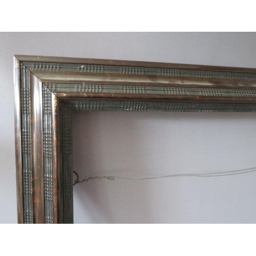 79 - A LATE 19TH / EARLY 20TH CENTURY FAUX TORTOISESHELL DUTCH FRAME, frame W 9 cm, rebate 54 x 65 cm