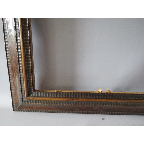 80 - A 19TH CENTURY DUTCH DECORATIVE WOODEN FRAME, frame W 9.5 cm, rebate 48 x 57 cm