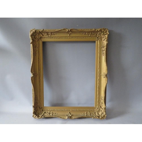 81 - A 19TH CENTURY GOLD SWEPT FRAME WITH RESTORATION, frame W 8 cm, rebate 52 x 42 cm