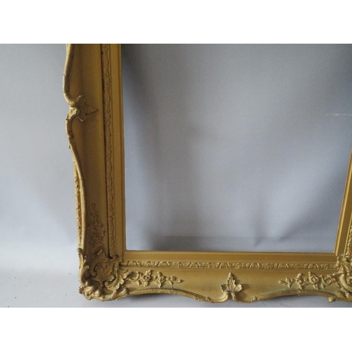 81 - A 19TH CENTURY GOLD SWEPT FRAME WITH RESTORATION, frame W 8 cm, rebate 52 x 42 cm