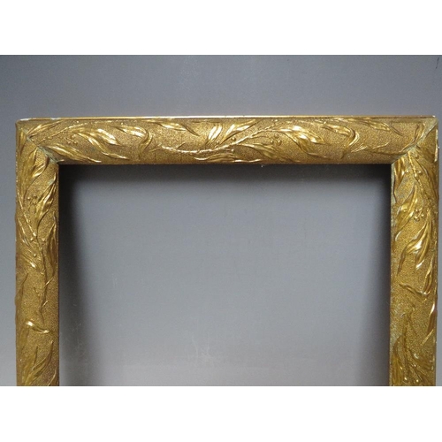 85 - A 19TH CENTURY DECORATIVE ART NOUVEAU GOLD FRAME, frame W 4 cm, rebate 34 x 29 cm