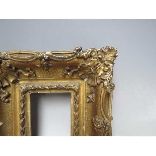 88 - A 19TH CENTURY GOLD SWEPT PORTRAIT MINIATURE FRAME, frame W 8 cm, rebate 11 x 9 cm