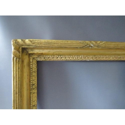93 - AN 18TH CENTURY GILT FRAME WITH EGG AND DART DESIGN TO OUTER EDGE, frame W 7 cm, rebate 62 x 48 cm